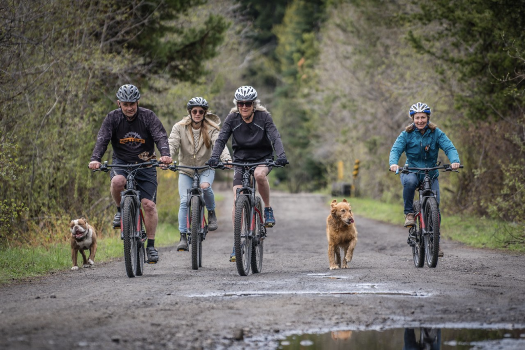 Photo by: Travel Penticton; bring your furry friends along when you bike the famous Kettle Valley Railway Trail.