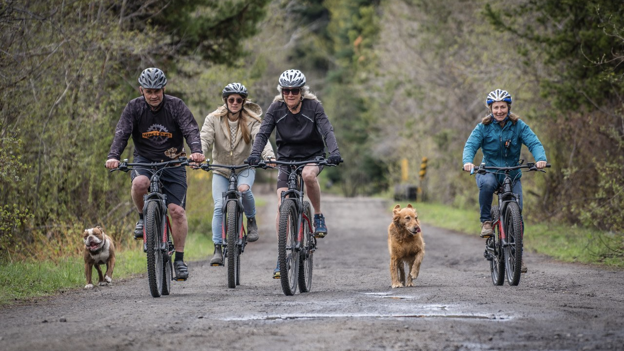 Photo by: Travel Penticton; bring your furry friends along when you bike the famous Kettle Valley Railway Trail.